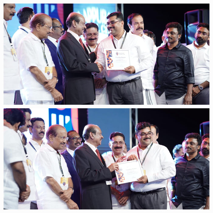 Honorable Managing Director, Mr. Nuvais C., is receiving a memento as the Title Sponsor of Malappuram Football Club (MFC) from Mr. M.A. Yusuff Ali, Chairman of Lulu Group.